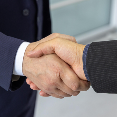 Close-up handshake between two business professionals
